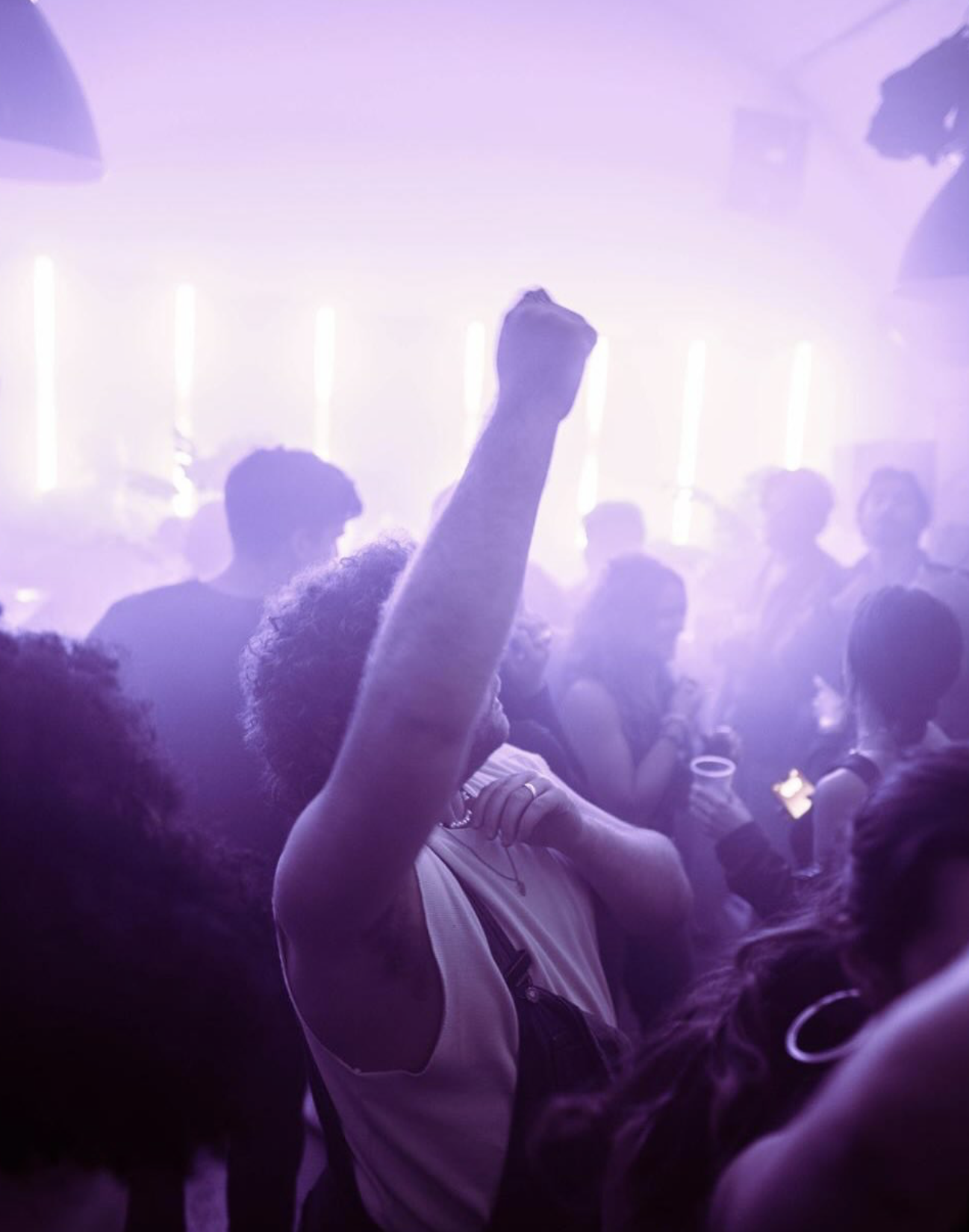 Adults partying at a club night in Arch 353